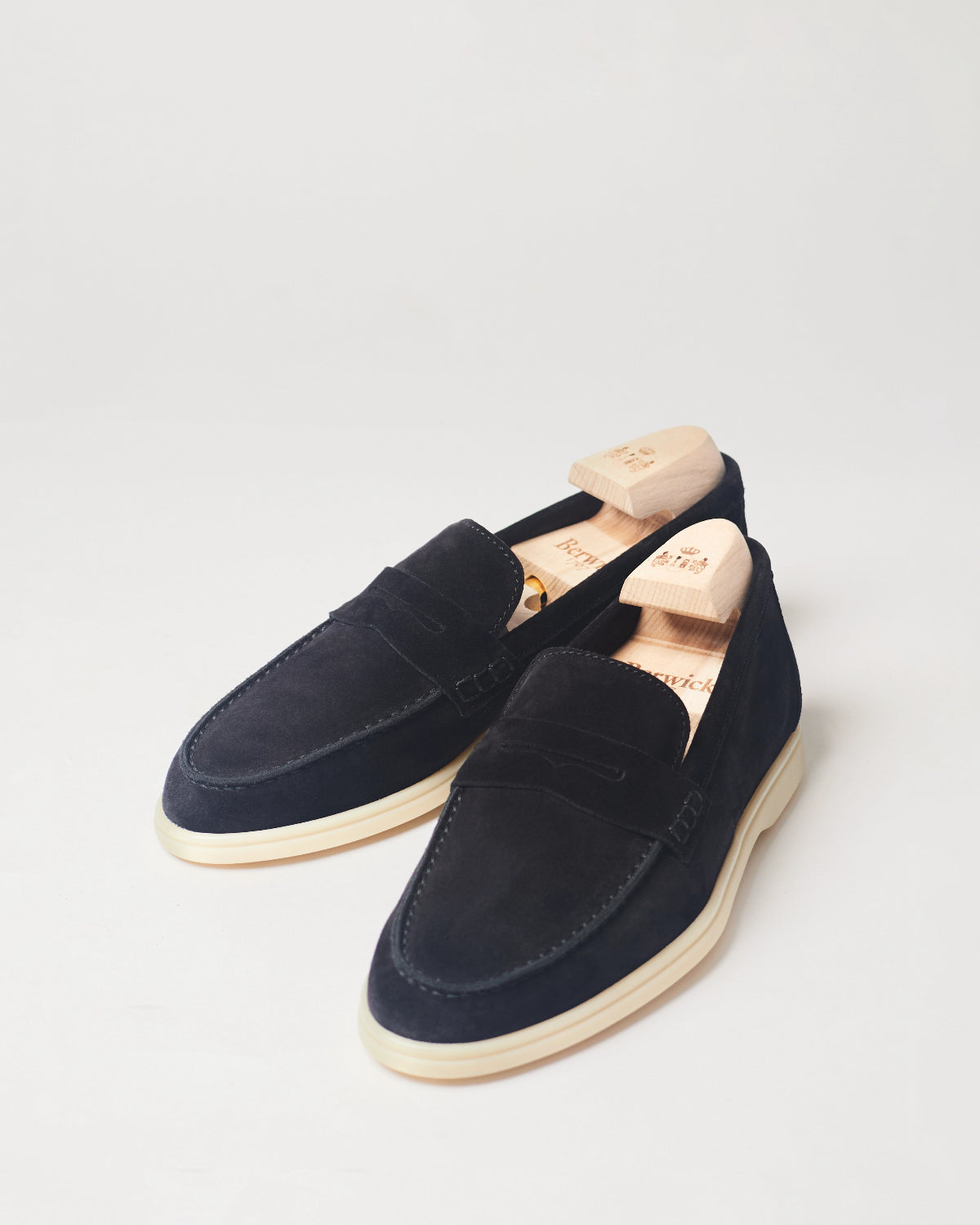 Berwick Flex Walk Penny Loafer 10133 Go Rain Janus Suede Black leather shoes pair front angle view