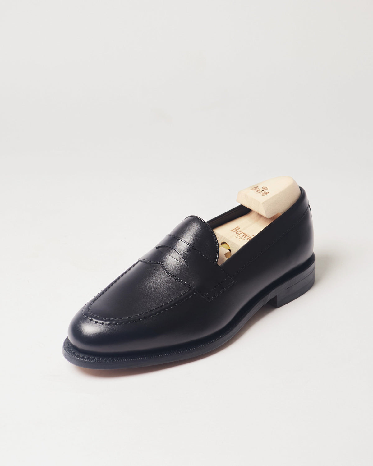Berwick Penny Loafer 5138 Box Calf Black smooth leather single shoe front angle view