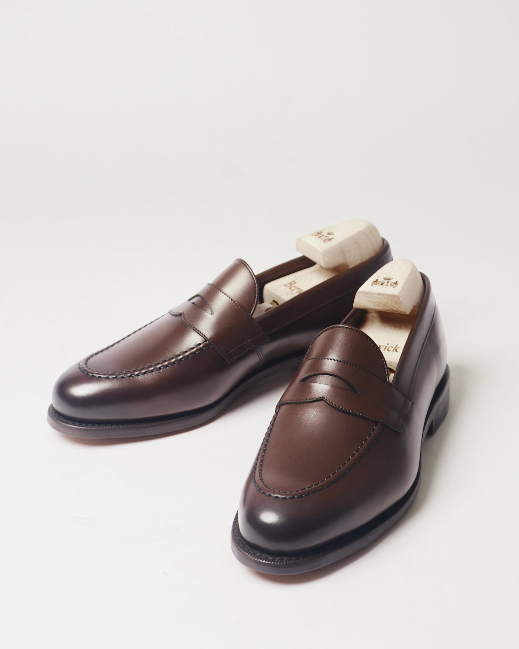 Berwick Penny Loafer 5138 Nomera Dark Brown smooth leather shoes pair front angle view