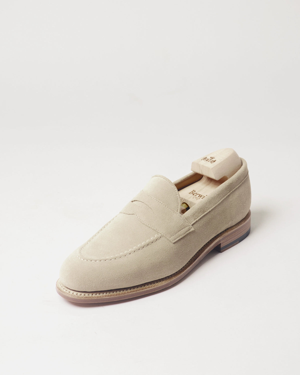 Berwick Penny Loafer 5138 Repello Suede Gaucho dark brown single shoe front angle view