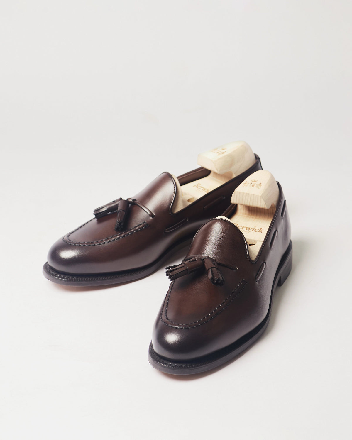 Berwick Tassel Loafer 5139 Nomera Dark Brown smooth leather shoes pair front angle view