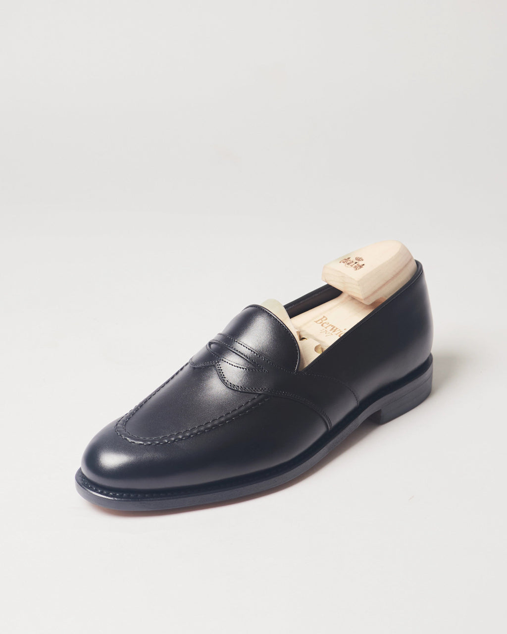 Berwick Dress Full Strap Loafer 5794 Box Calf Black smooth leather single shoe front angle view