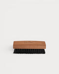 Saphir Polishing Brush with black horsehair bristles and wooden handle side view