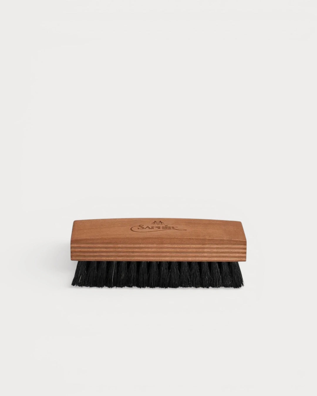 Saphir Polishing Brush with black horsehair bristles and wooden handle side view